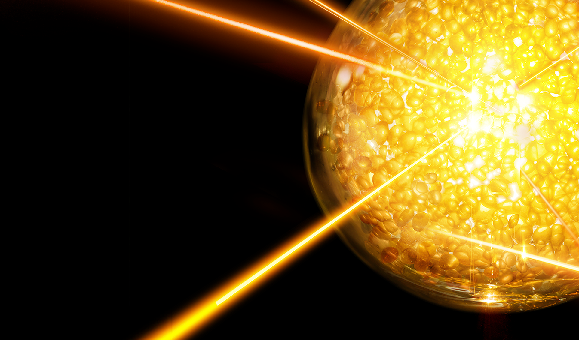 Spherical object with glowing center and beams of light on a dark background